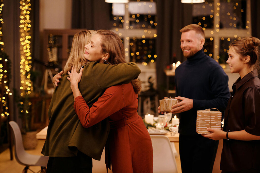 An armchair pulled away from the main seating area with a small accent table, demonstrating Furniture Layout Tips for creating conversation islands.