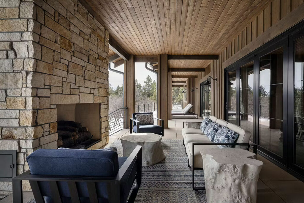 How to style a patio with a central coffee table, symmetry, and a patterned outdoor rug in Chattanooga, Tennessee.