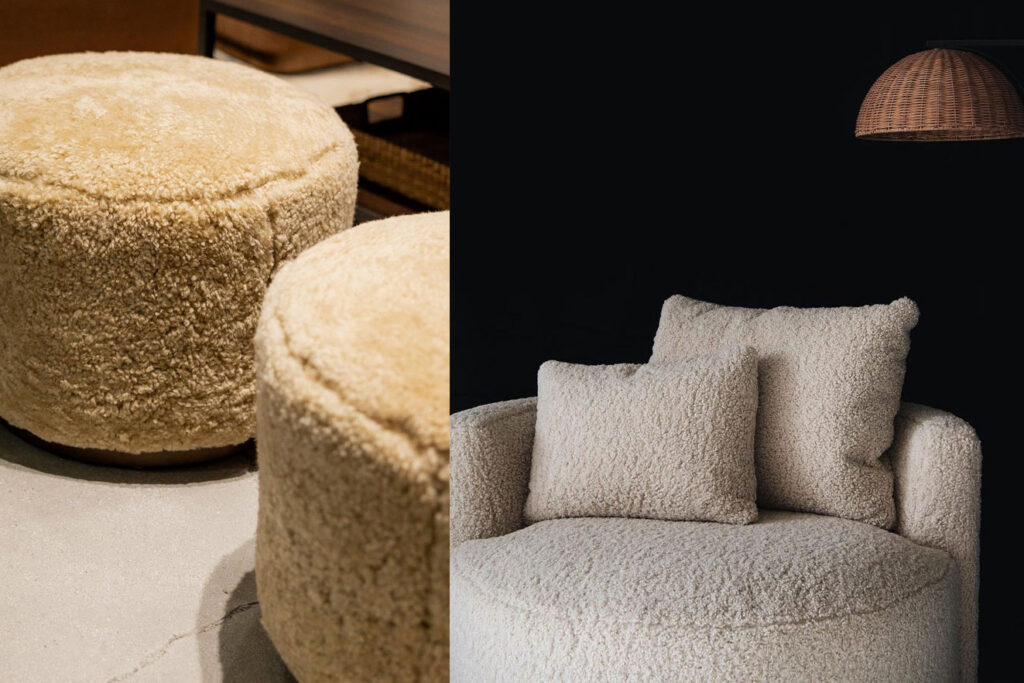 Bouclé furniture in warm oat and cool gray tones including round bouclé ottomans and an oversized bouclé accent chair with textured throw pillows available at Fowler Brothers Co. Chattanooga